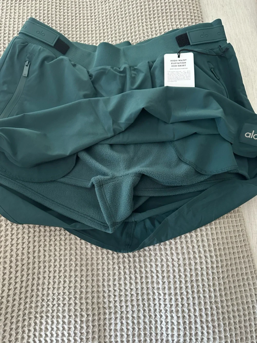 NWT: ALO Yoga Women's High Waist Elevation Mini Skirt, Midnight Green, Large